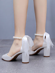 Peep Toe Sandalen mit Schleifen und Perlen am Blockabsatz